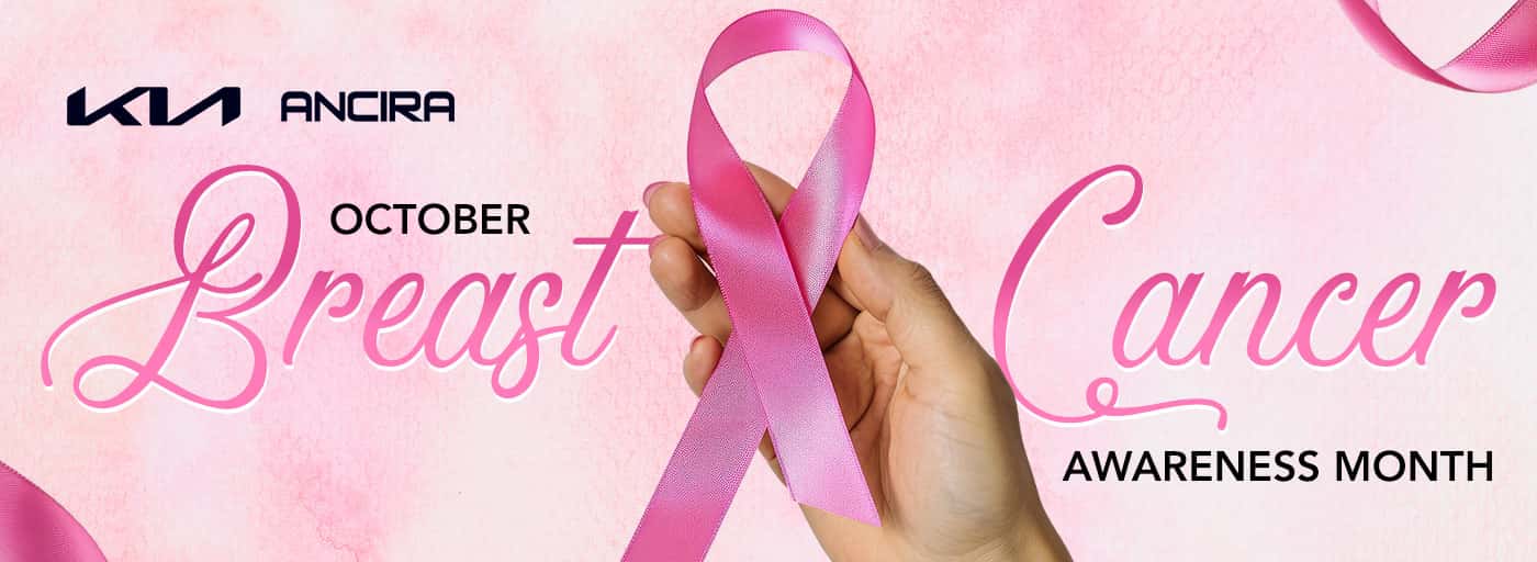 Pink Breast Cancer Awareness Month banner featuring a hand holding a pink awareness ribbon, with the Ancira logo and October Breast Cancer Awareness Month text on a soft pink background.