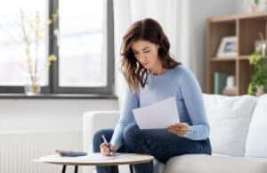 Girl looking at used car loans online