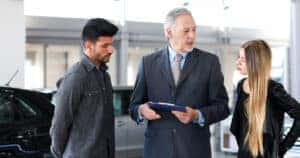 Sales rep talking with customers