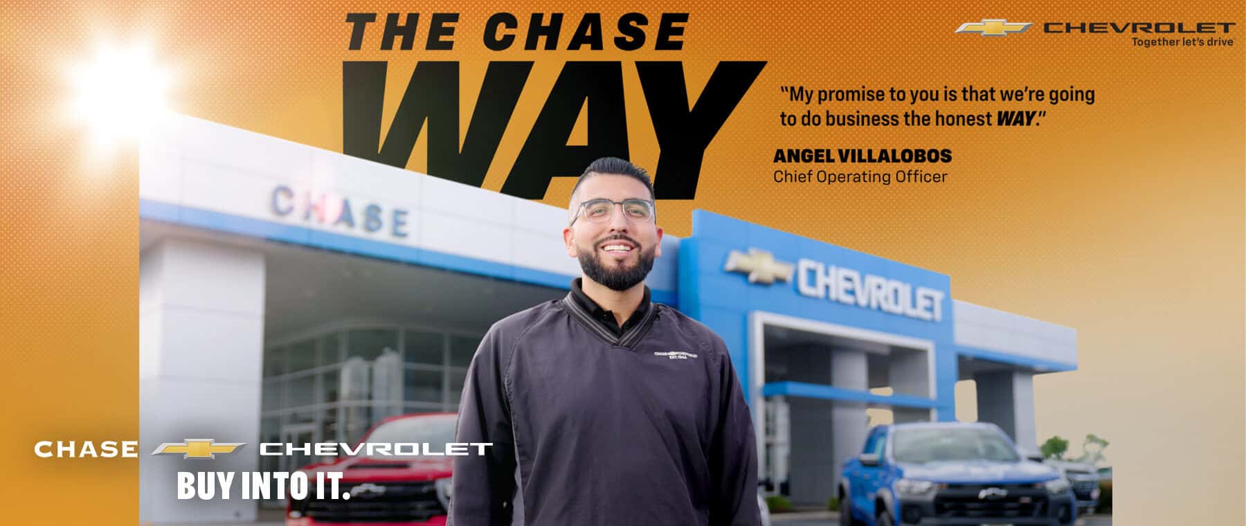 Angel Villalobos, Chief Operating Officer of Chase Chevrolet, standing in front of the dealership with the message “The Chase Way.”