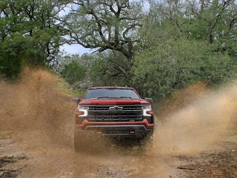 Chevy Silverado 1500 going through rough terrain