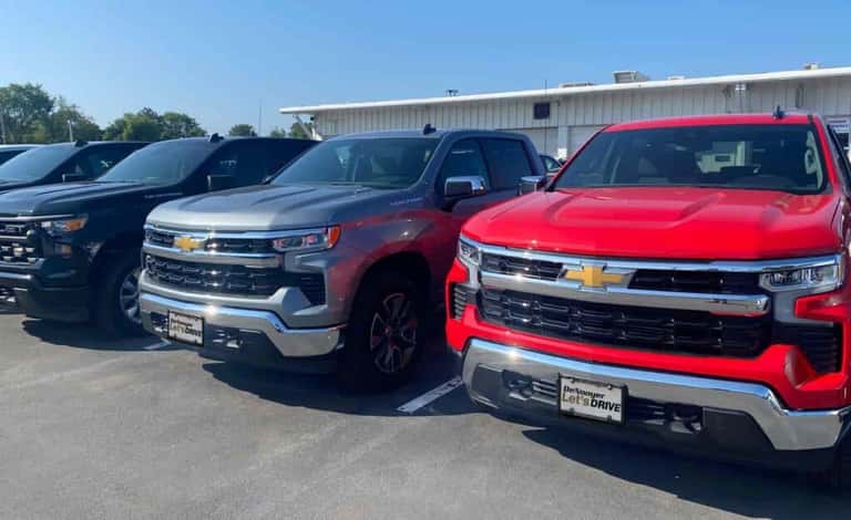 Lineup of Chevrolet Courtesy Transportation Vehicles at DeNooyer dealership
