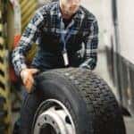 Tire tread inspection during tire service near Wolf Road in Colonie, NY at DeNooyer Chevrolet