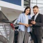 Chevy shoppers comparing new and used vehicles at DeNooyer Chevrolet in Colonie near Albany NY