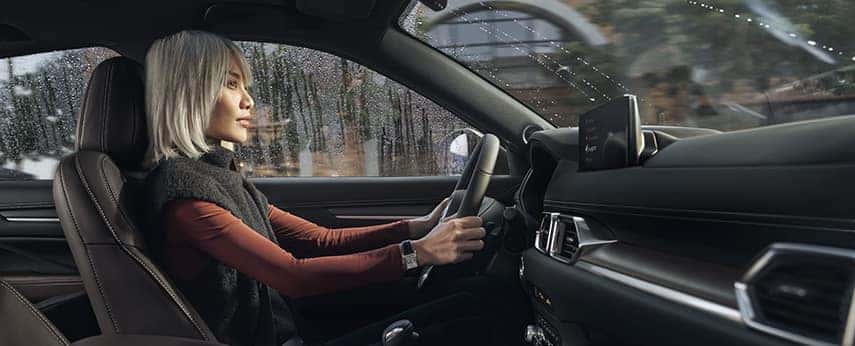 Person Driving Mazda CX5