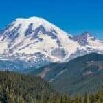 Mount Rainier towering over other mountains