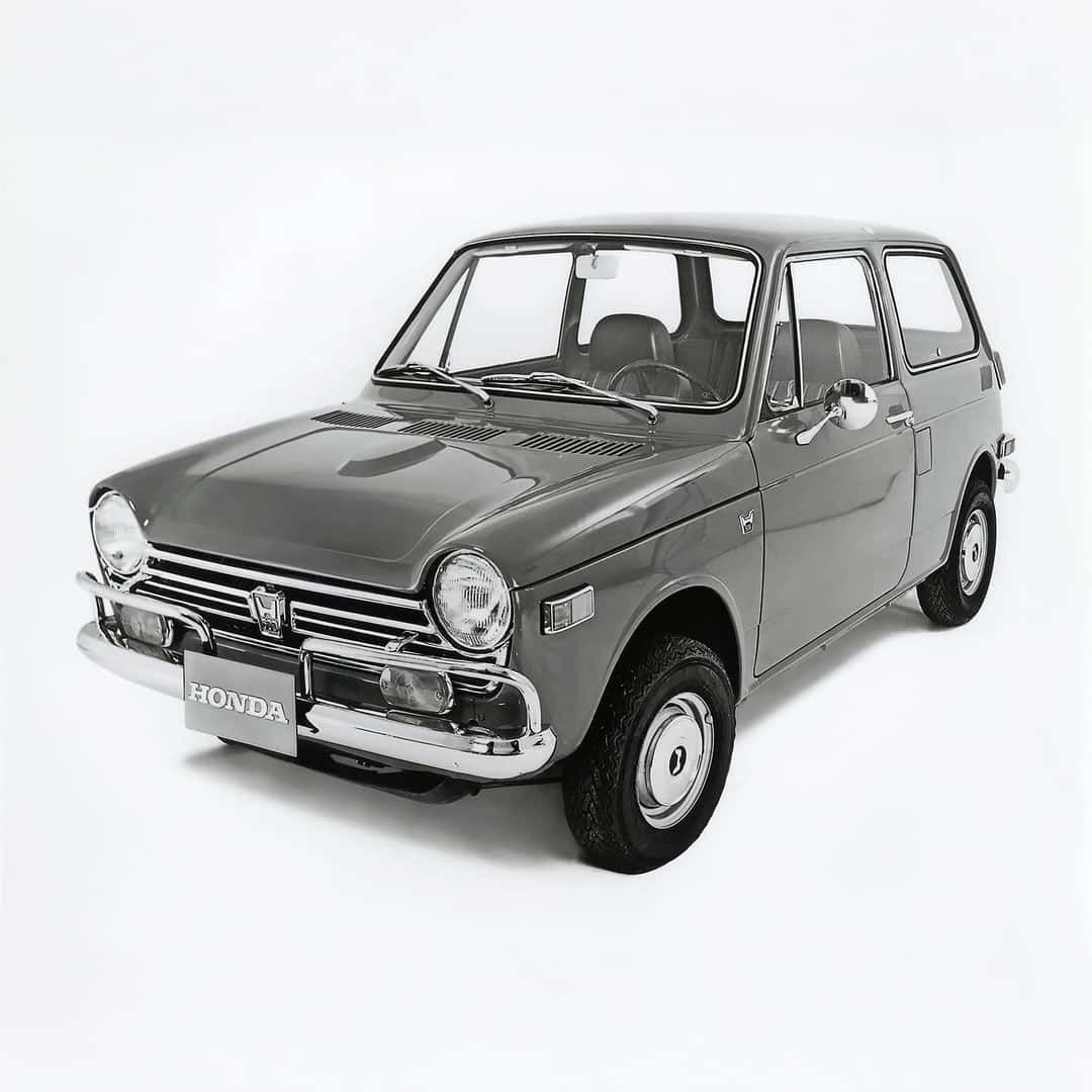 1967 honda N600 hatchback in a studio setting
