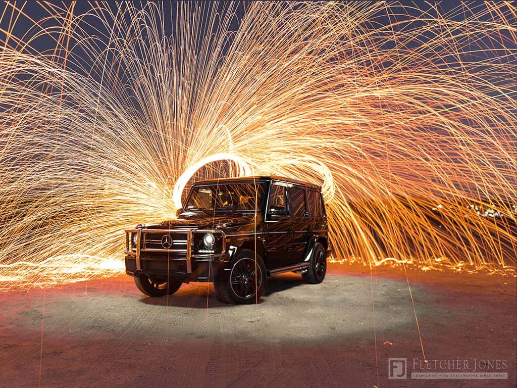 Mercedes-Ben G-Class with Fireworks Behind It