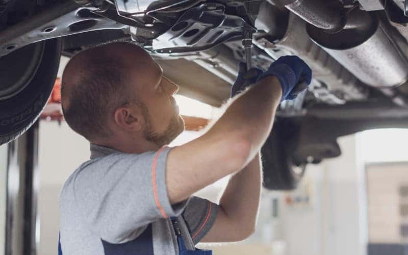 mechanic-working-under-a-car