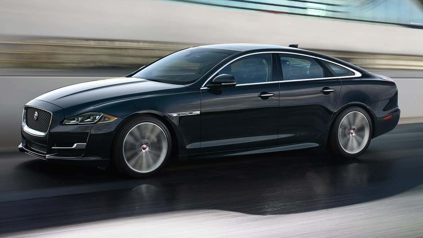 2018 Jaguar XJ Side Profile view driving