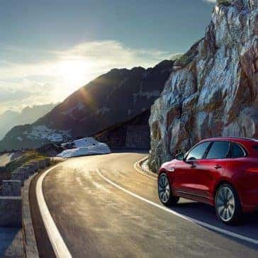 2019 Jaguar F-Pace driving around corner