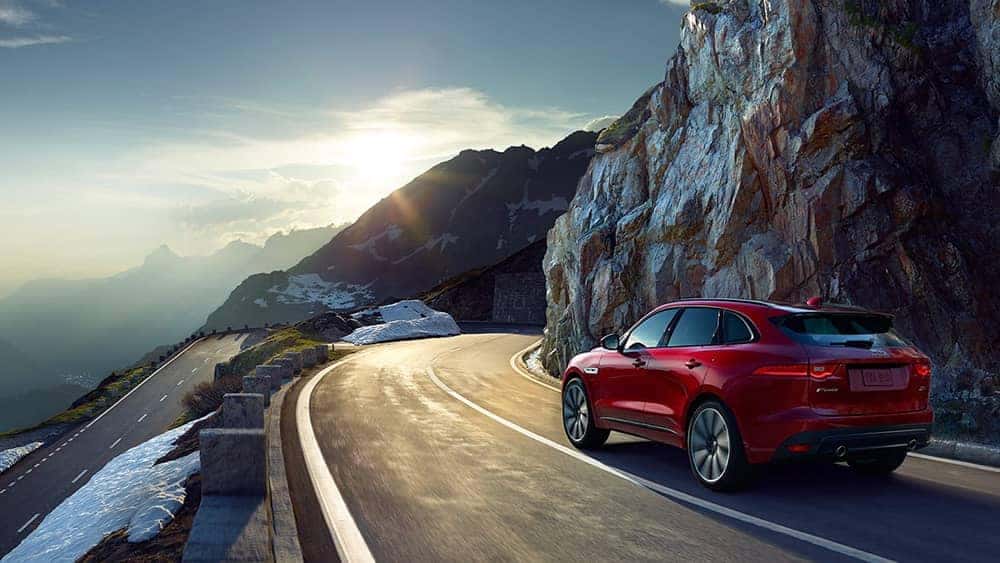 2019 Jaguar F-Pace driving around corner