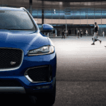2019 Jaguar F-PACE near crowd of people
