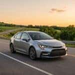 Toyota Corolla driving on an open road highlighting Toyota Corolla reliability and lifespan