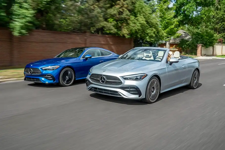 Two Mercedes-Benz Driving