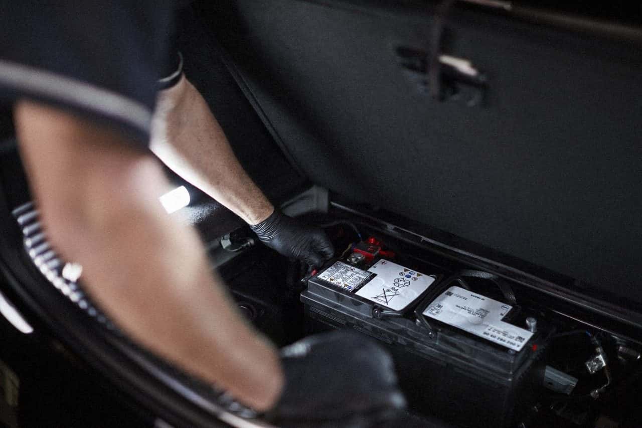 Certified technician replacing a Genuine Mercedes-Benz battery at Mercedes-Benz of Laguna Niguel