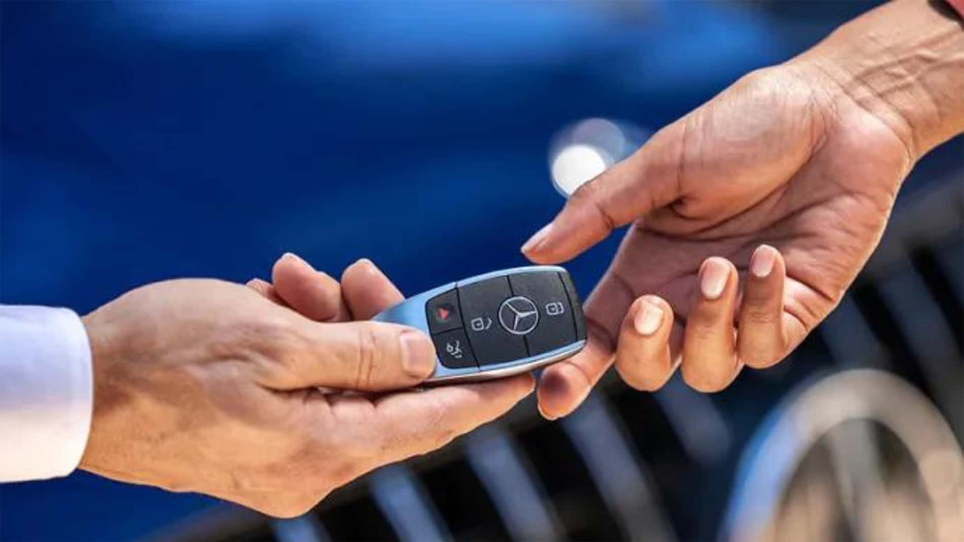 Mercedes-Benz owner picking up their vehicle after financing service with Sunbit at Mercedes-Benz of Laguna Niguel