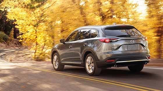 2018 Mazda CX-9 driving down curved road