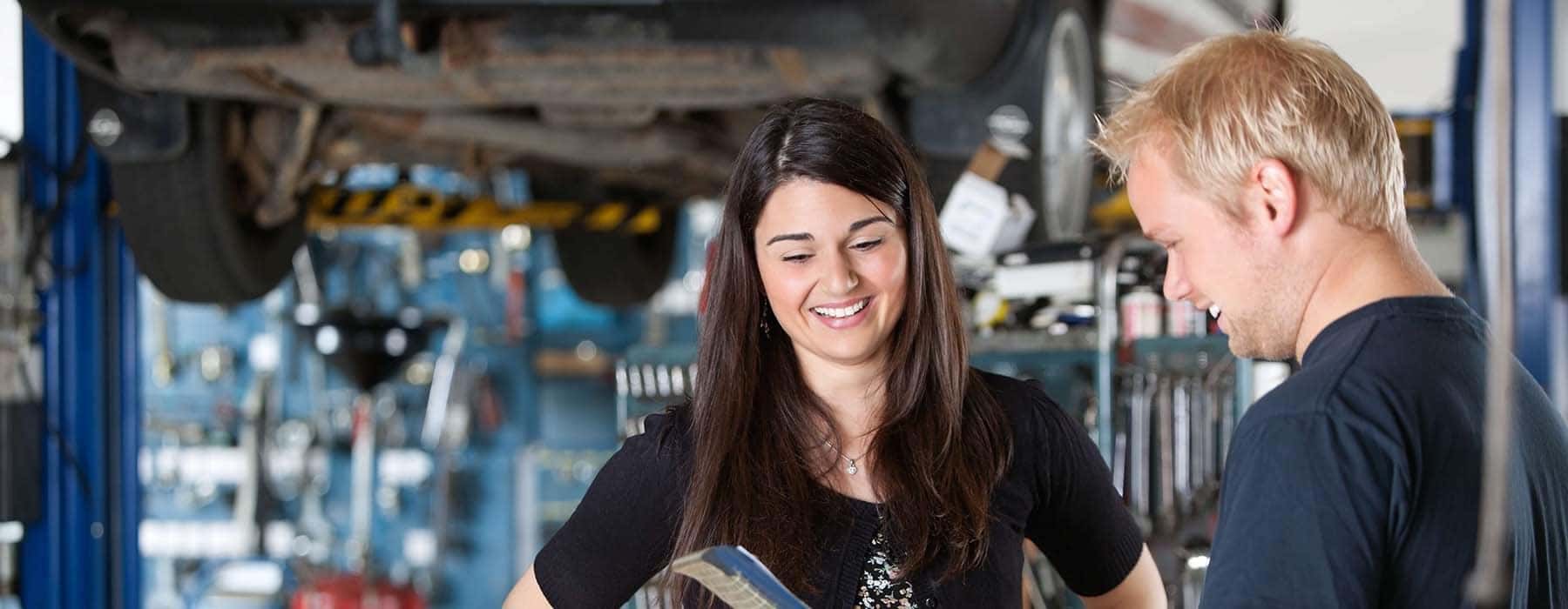 Mechanic Talking to Woman