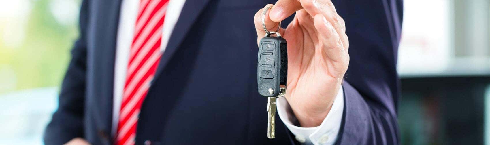 Holding Up Car Keys