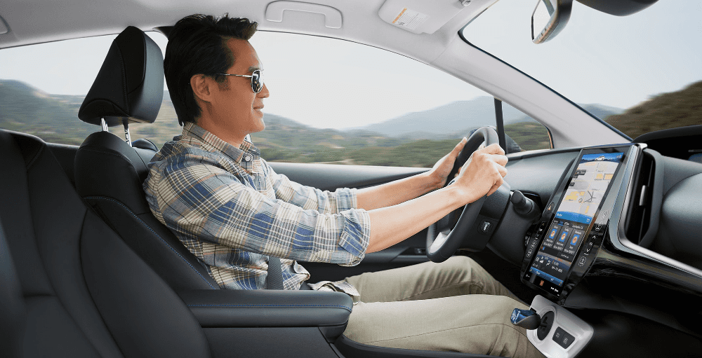 man driving 2018 Toyota Prius