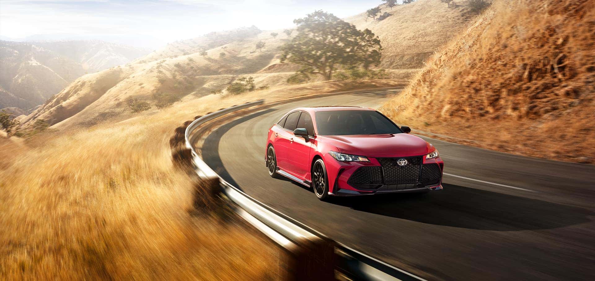 2020 Toyota red vehicle driving