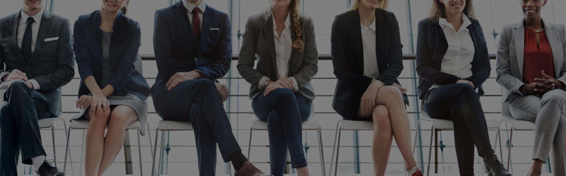 employees sitting in a row