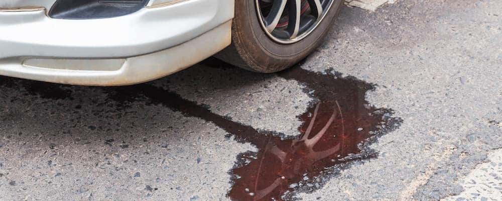 Green Fluid Leaking From Car And Smoking