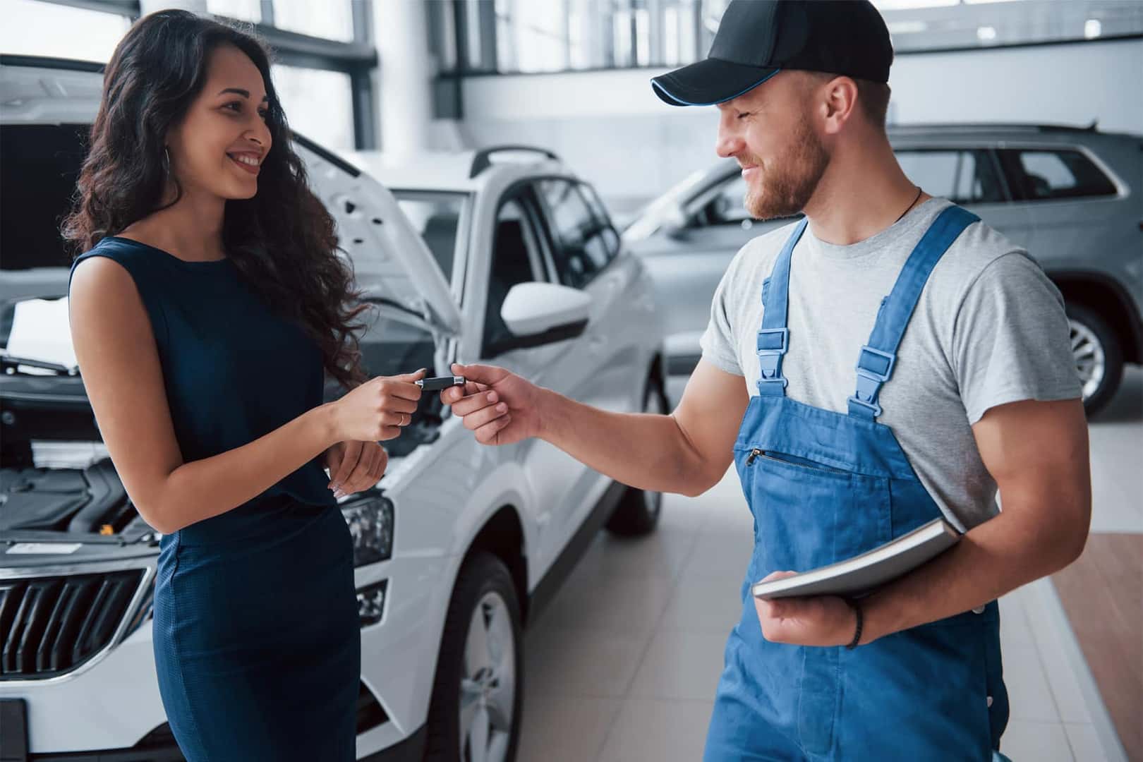 Technician performing Honda oil change in Nashua, NH