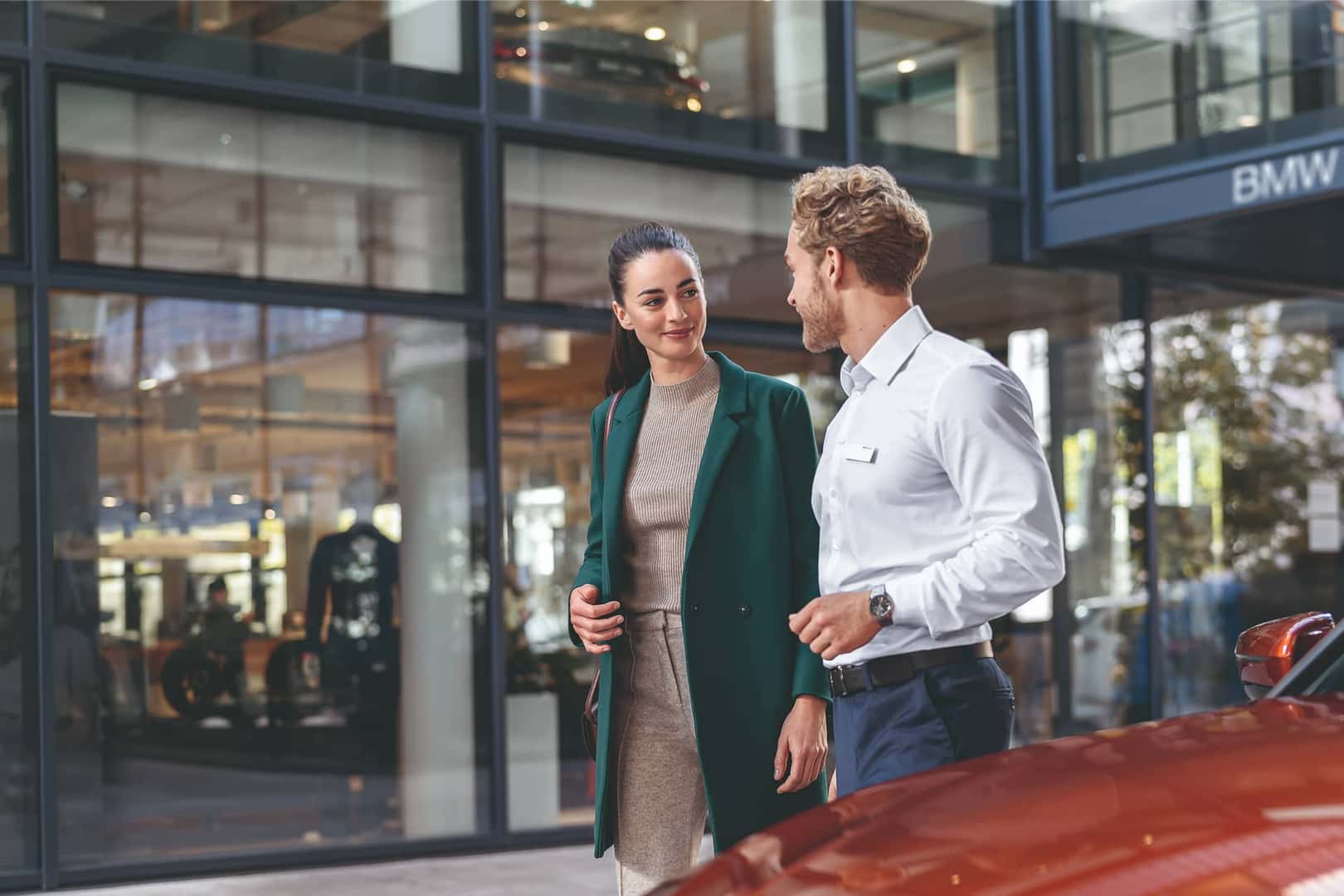 customer talking at bmw dealership
