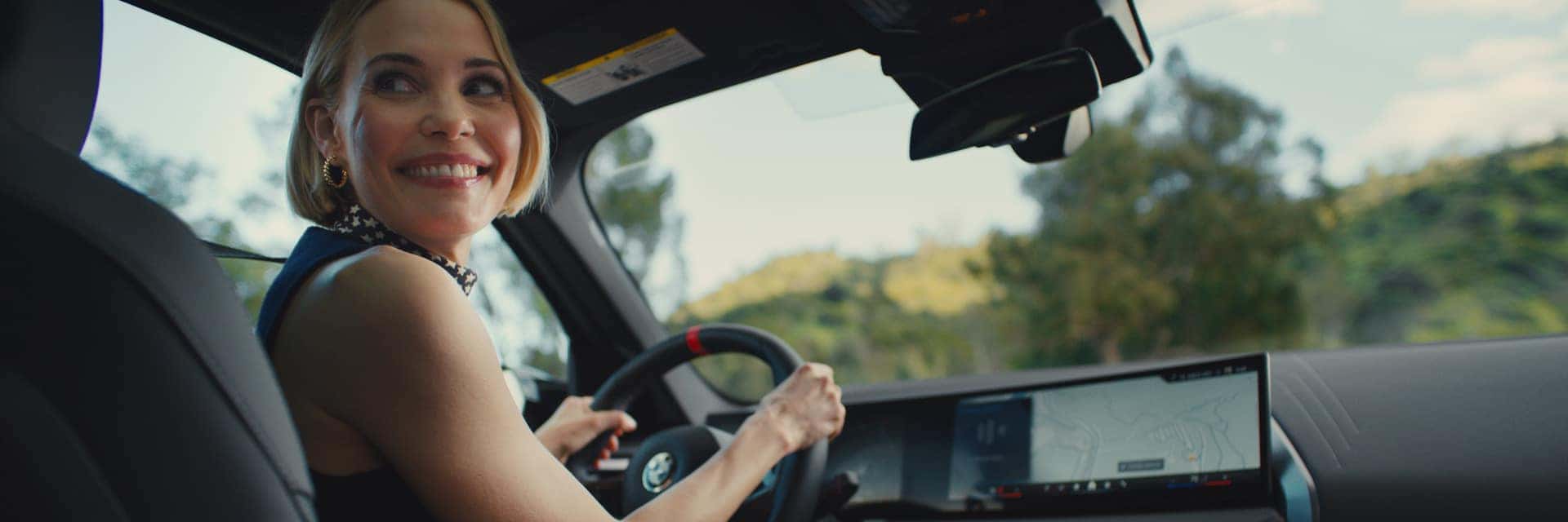 woman driving x3 series