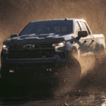 Silverado 1500 driving through mud puddle