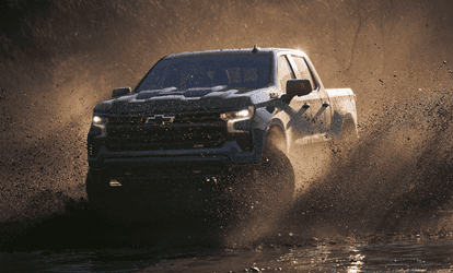Chevy Silverado Driving through the mud