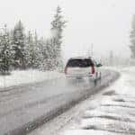 SUV driving in snow