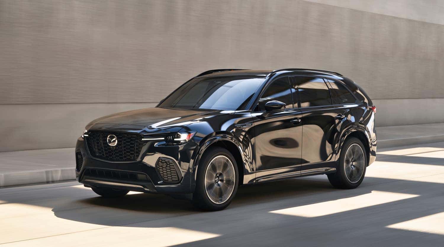 A 2025 Mazda CX-70 cruising on the highway