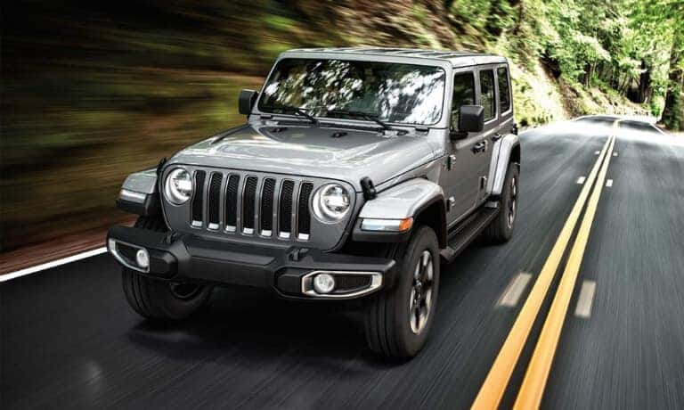 2020 Jeep Wrangler exterior driving through woods