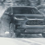 A Honda HR-V driving on a snowy road