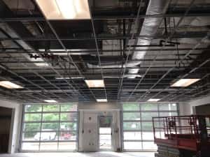 June 14, 2016 - Lighting and the drop ceiling is coming together in the new service drive.