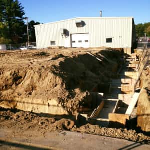 September 17, 2015 - More foundation work - concrete forms are in on the right side.