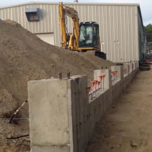 September 28, 2015 - Walls are set on the right side. The spaces represent service bay entrances.