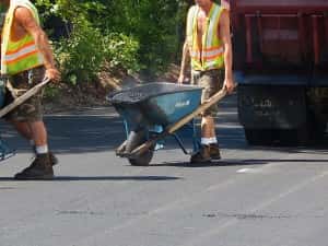 July 26, 2016 – It takes a lot of manual labor to work with the machines for paving. Sunnyside Acura Nashua, NH