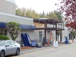 Former Service entrance without the exterior signage and glass. — at Sunnyside Acura of Nashua NH.