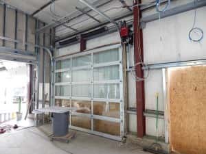 One of two glass doors that will lead you into the new service drive. — at Sunnyside Acura of Nashua NH.