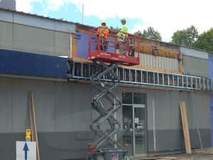 June 10, 2016 - Extending the trim on the side of the building..