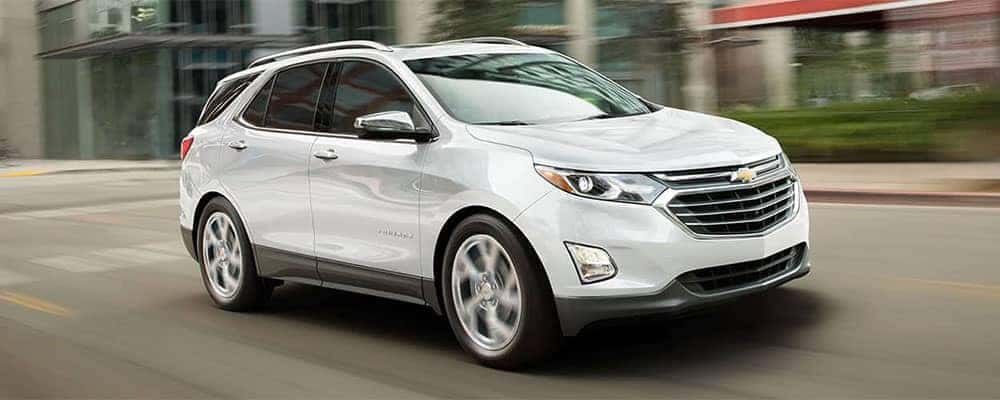 2019 Chevrolet Equinox white Driving in City