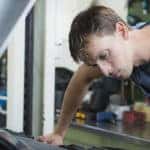 Mechanic checking car