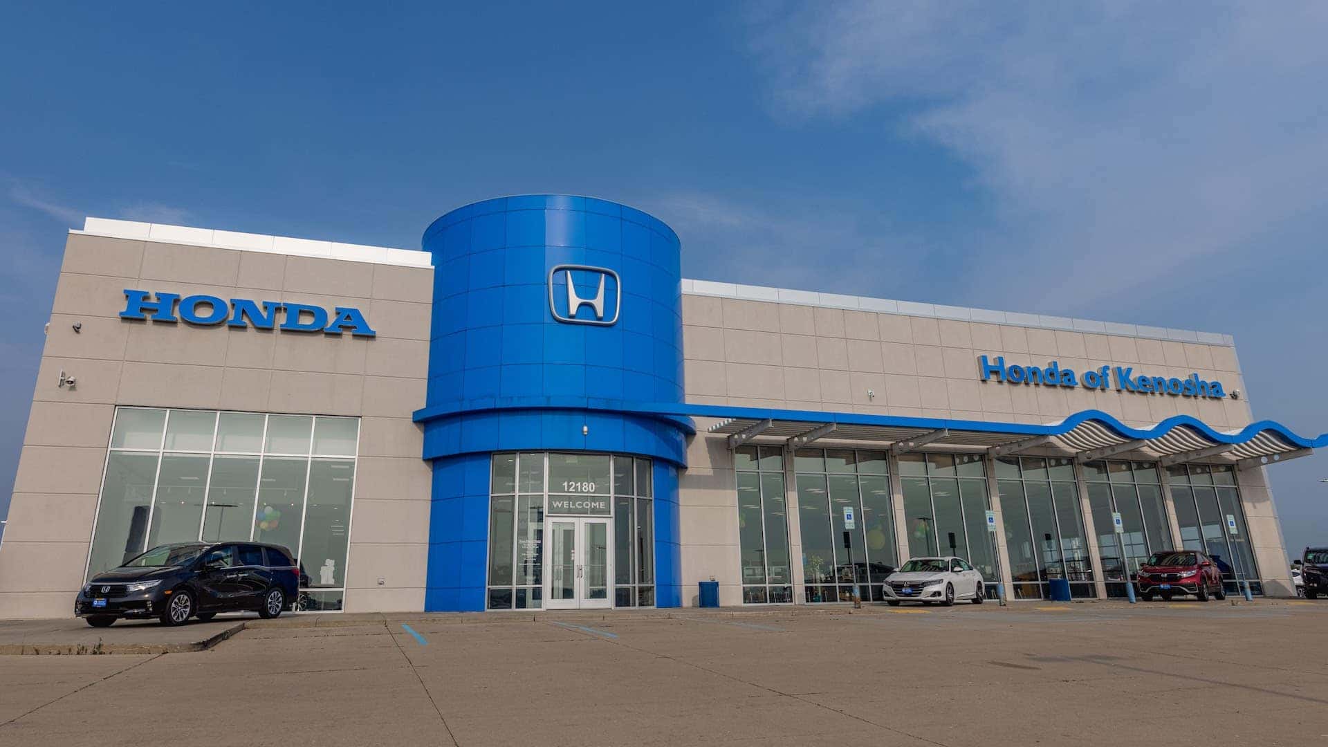 An exterior shot of a Honda dealership.