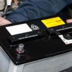 Mechanic Replacing Car Battery