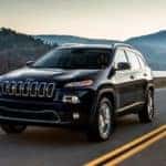 A 2014 Jeep Cherokee Trailhawk on a highway