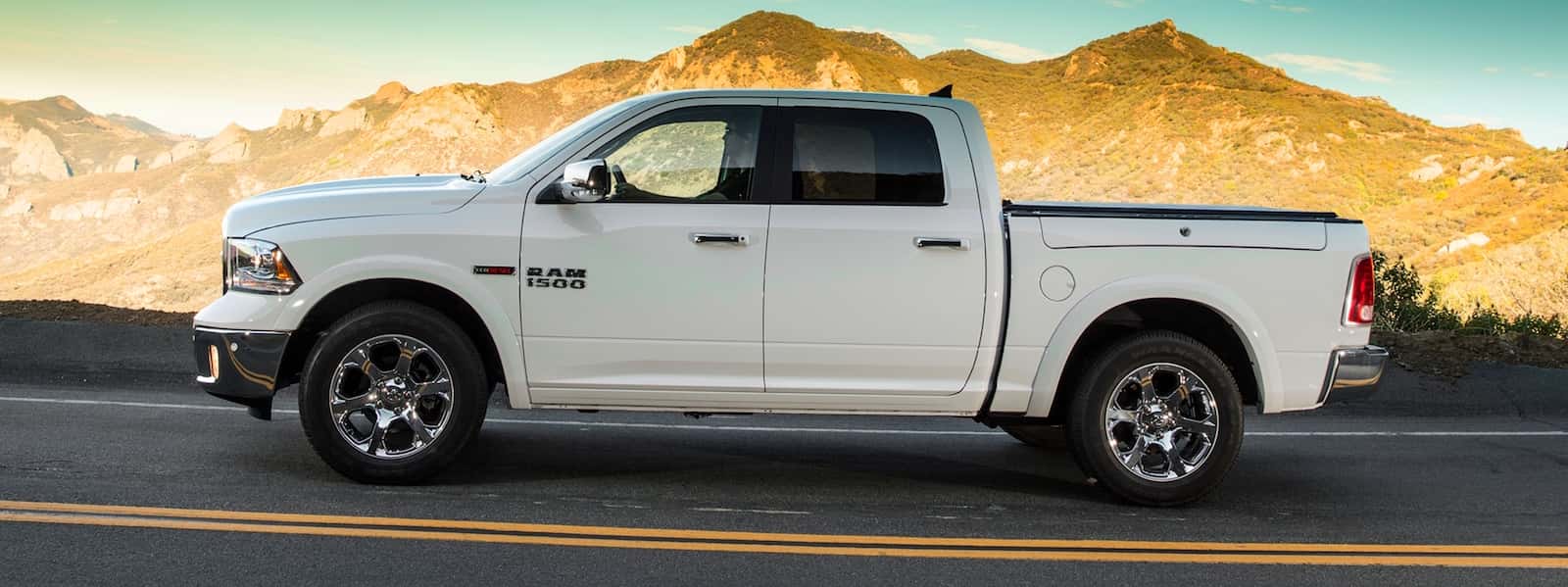 White 2014 RAM 1500 Driving on desert road – Colorado Springs, CO